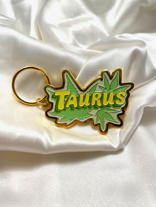 taurus keychain with marijuana leaves