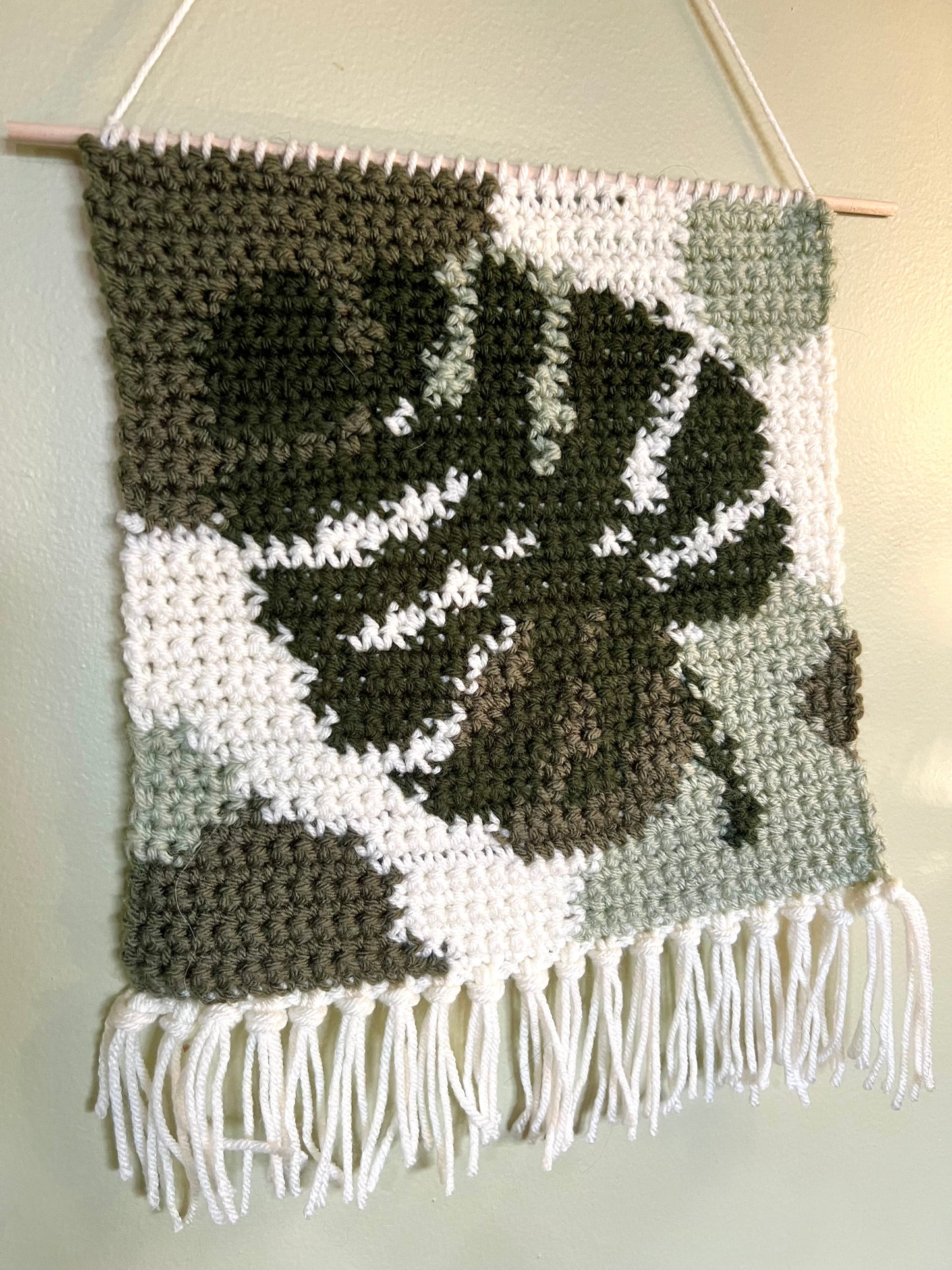 crocheted monstera tapestry