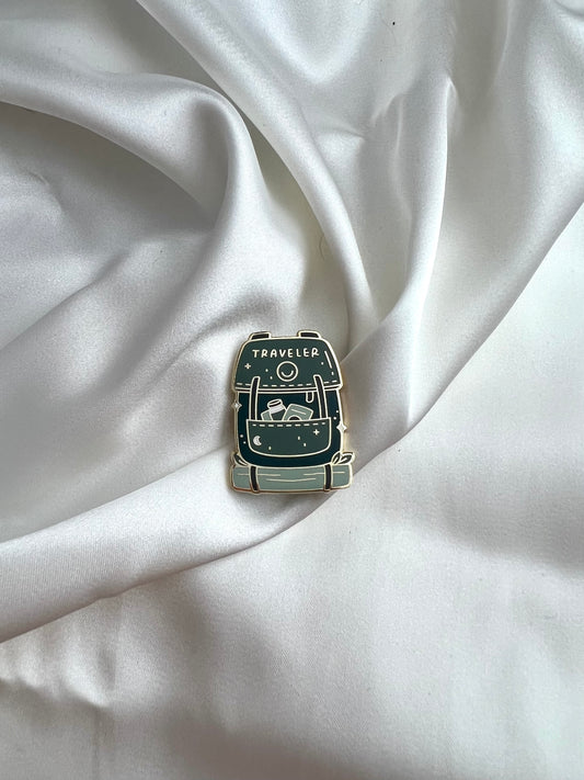 traveler's backpack enamel pin