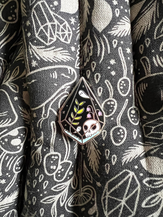 terrorium enamel pin